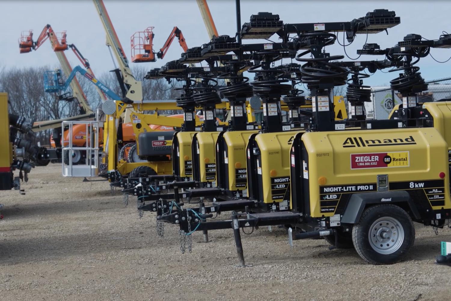 row of industrial generators for rent at a Ziegler lot