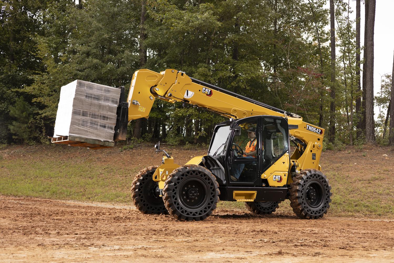 CAT telehandler for rent lifting heavy items 